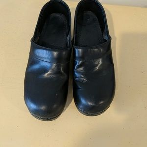 Dansko black leather clogs